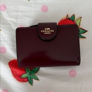 Coach medium corner zip burgundy wallet